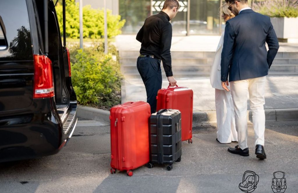 SYDNEY AIRPORT TRANSFER WITH BABY SEAT Driver unloading luggage
