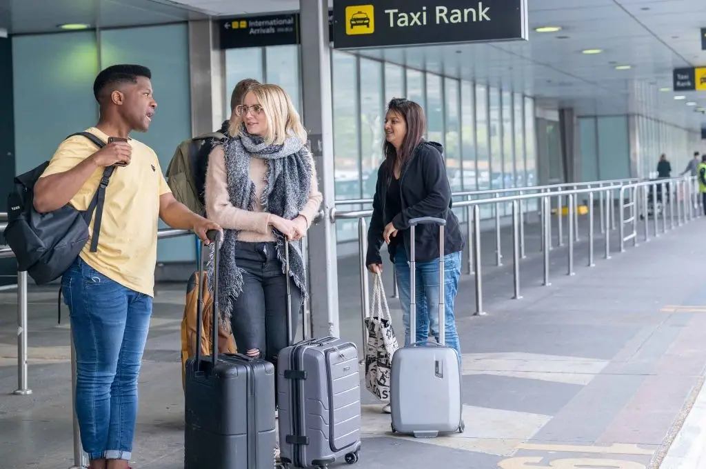 In Sydney International airport arrival international student are getting meet & greet service by TaxiWithBabySeat.com driver
